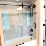 Hydroslide Shower Door with black hardware