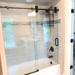 Hydroslide Shower Door with black hardware