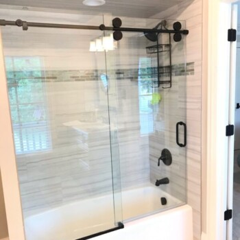Hydroslide Shower Door with black hardware