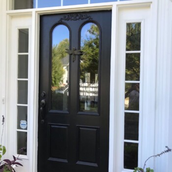 insulated glass door and window unit on black entry doorway