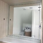 bevel framed mirror in bathroom